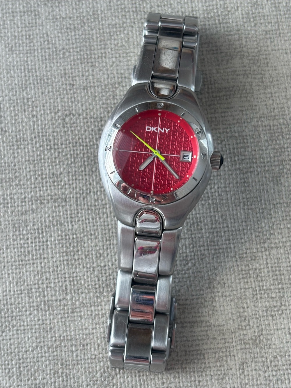 DKNY Silver Watch with Pink Dial and Yellow Second Hand